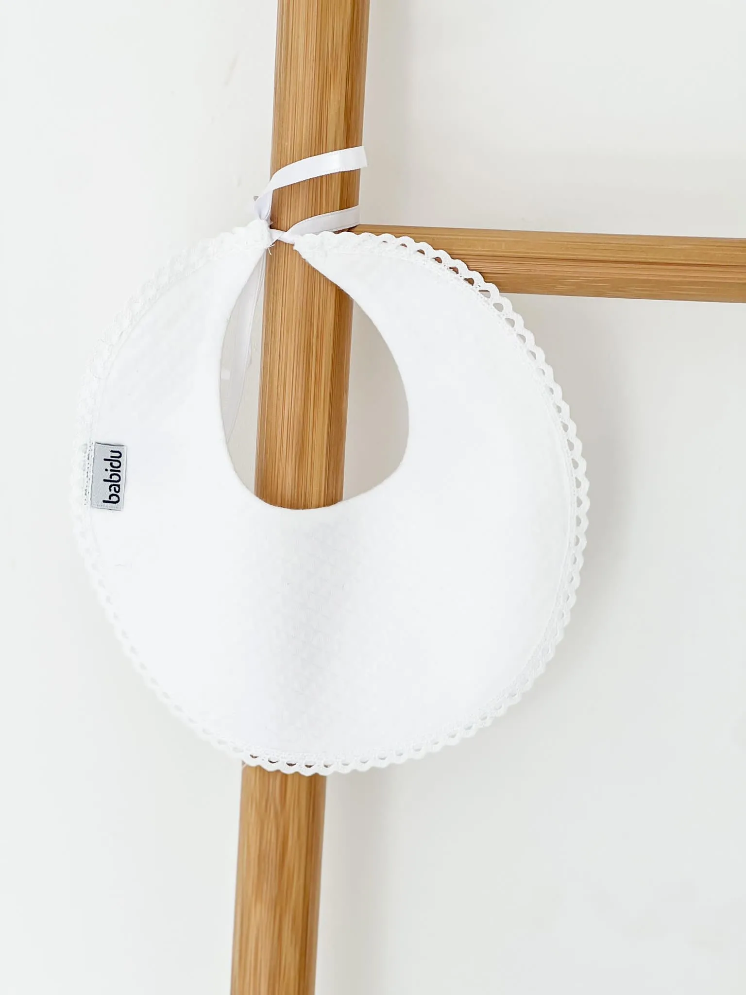 Babidu White quilted bib