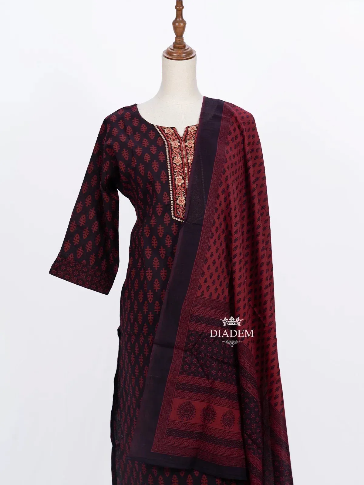 Burgundy Straight Cut Suit Adorned with Floral Prints and Thread work along with Dupatta