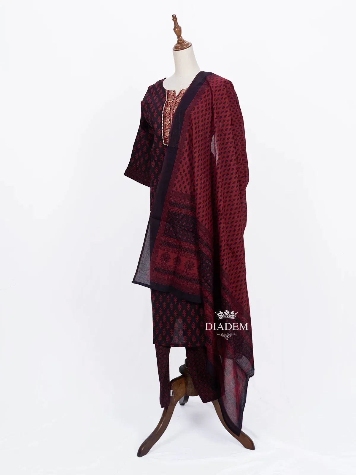 Burgundy Straight Cut Suit Adorned with Floral Prints and Thread work along with Dupatta