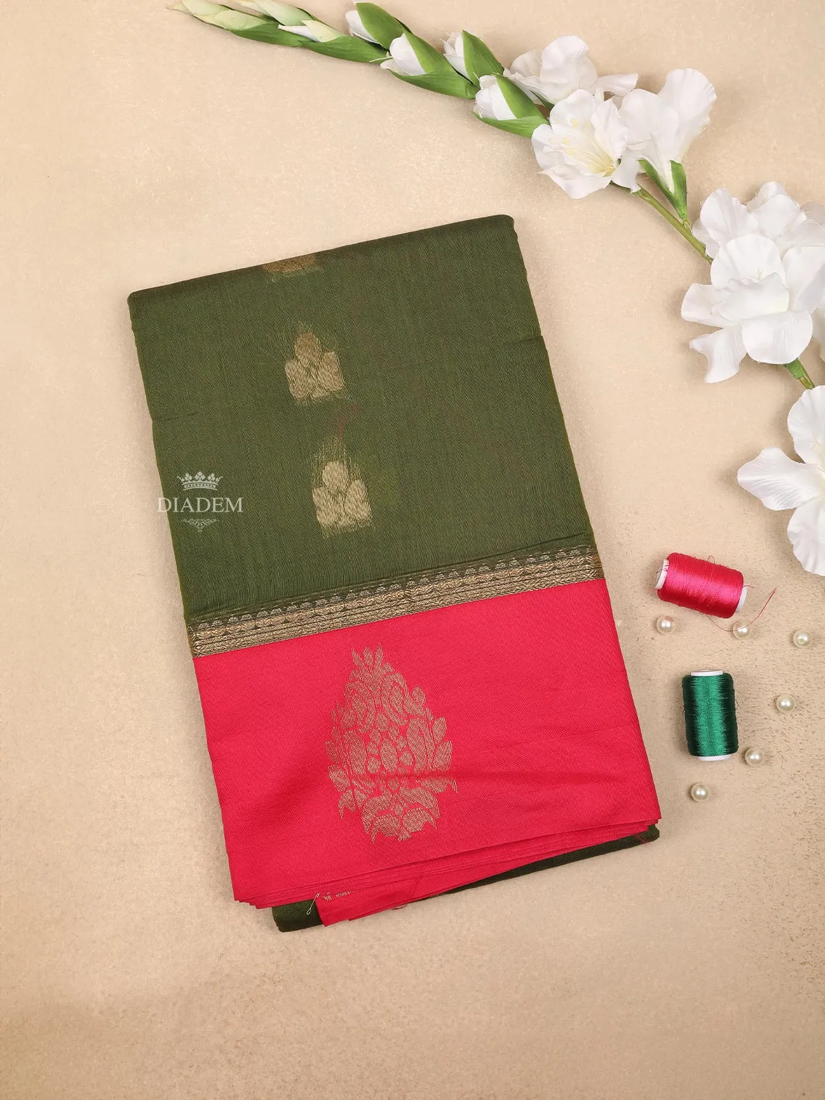 Dark Green Silk Cotton Saree with Floral Motif Design on the Body and Contrast Zari Border