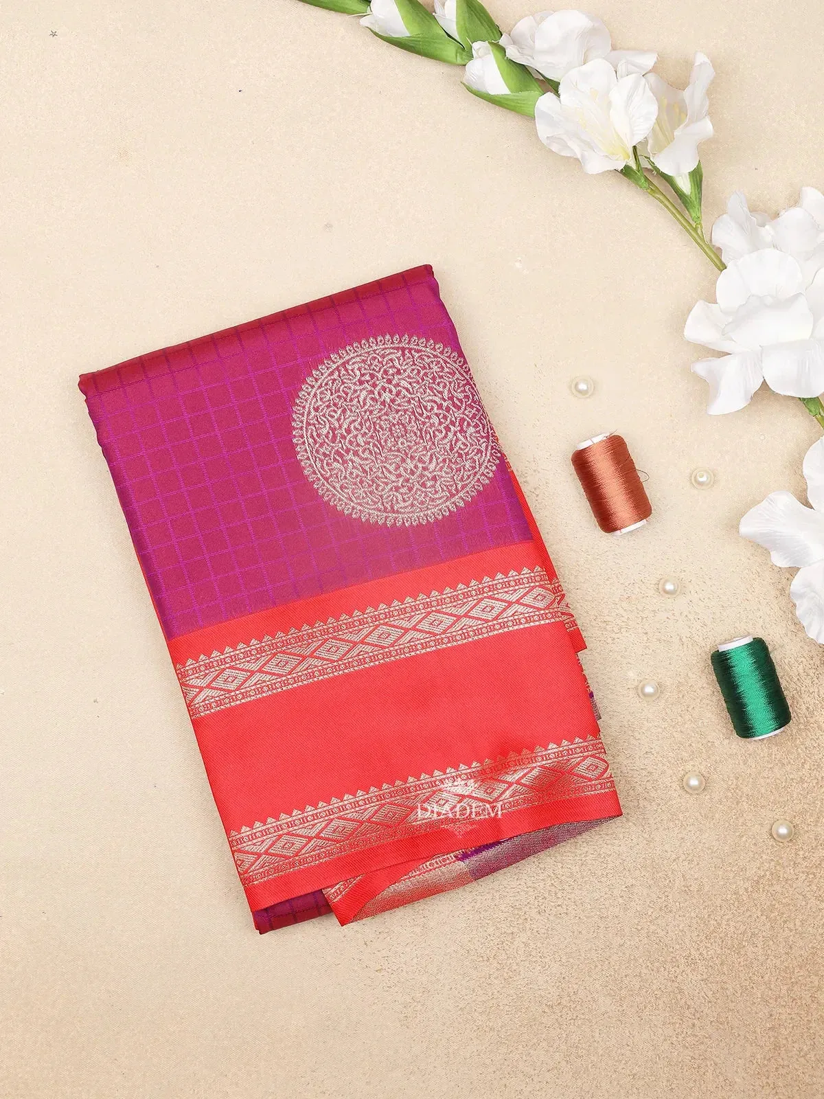 Dark Pink Art Silk Saree with Chakaram Motifs on the Body with Contrast Zari Border