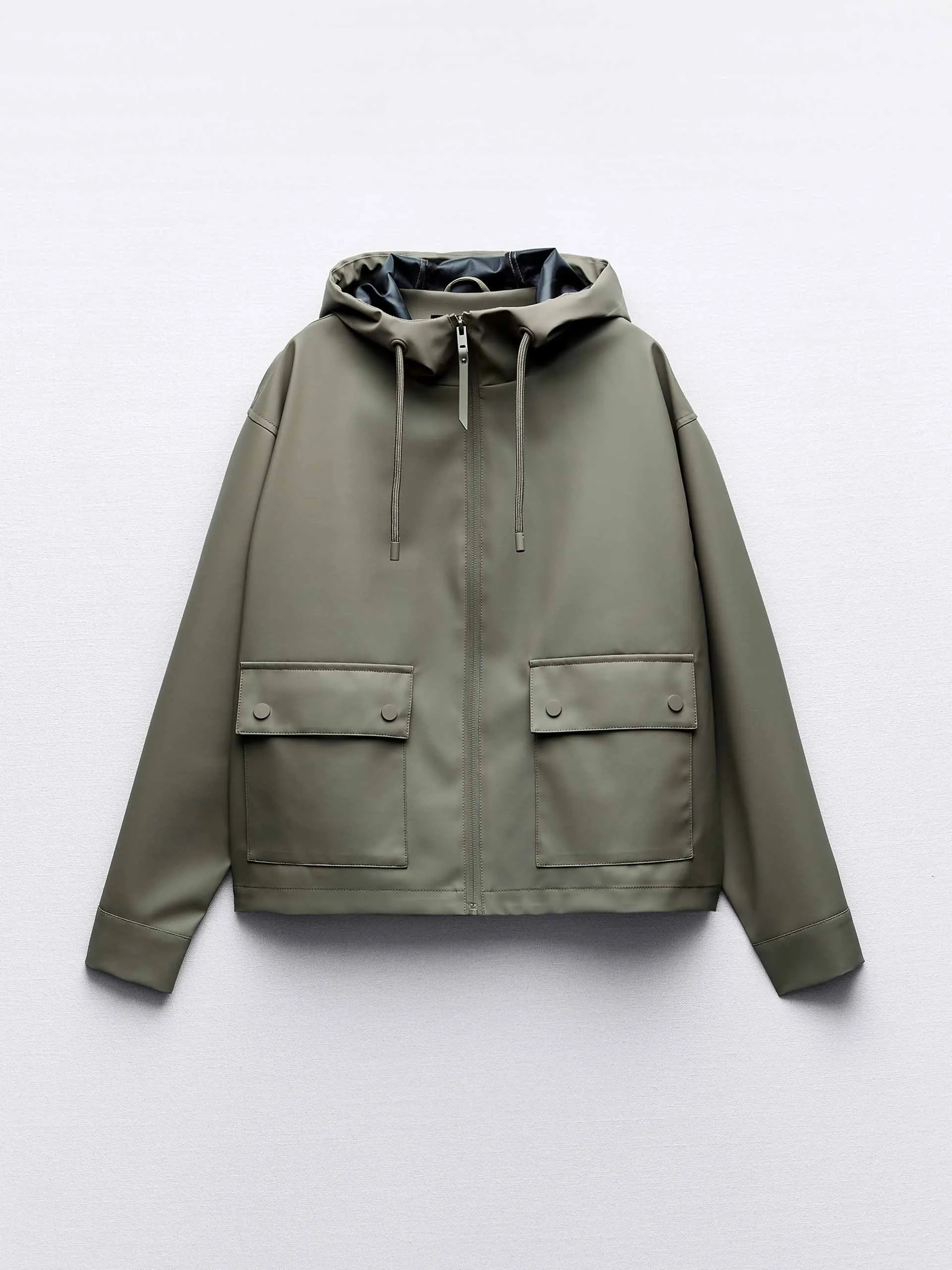 Khaki rubberised raincoat with hood