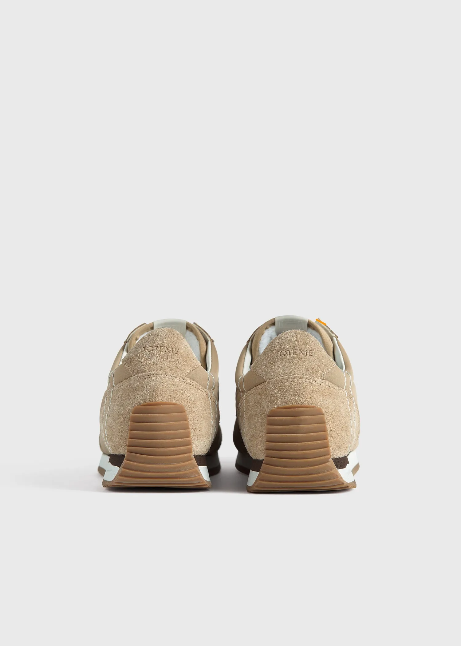 Sport sneakers sand