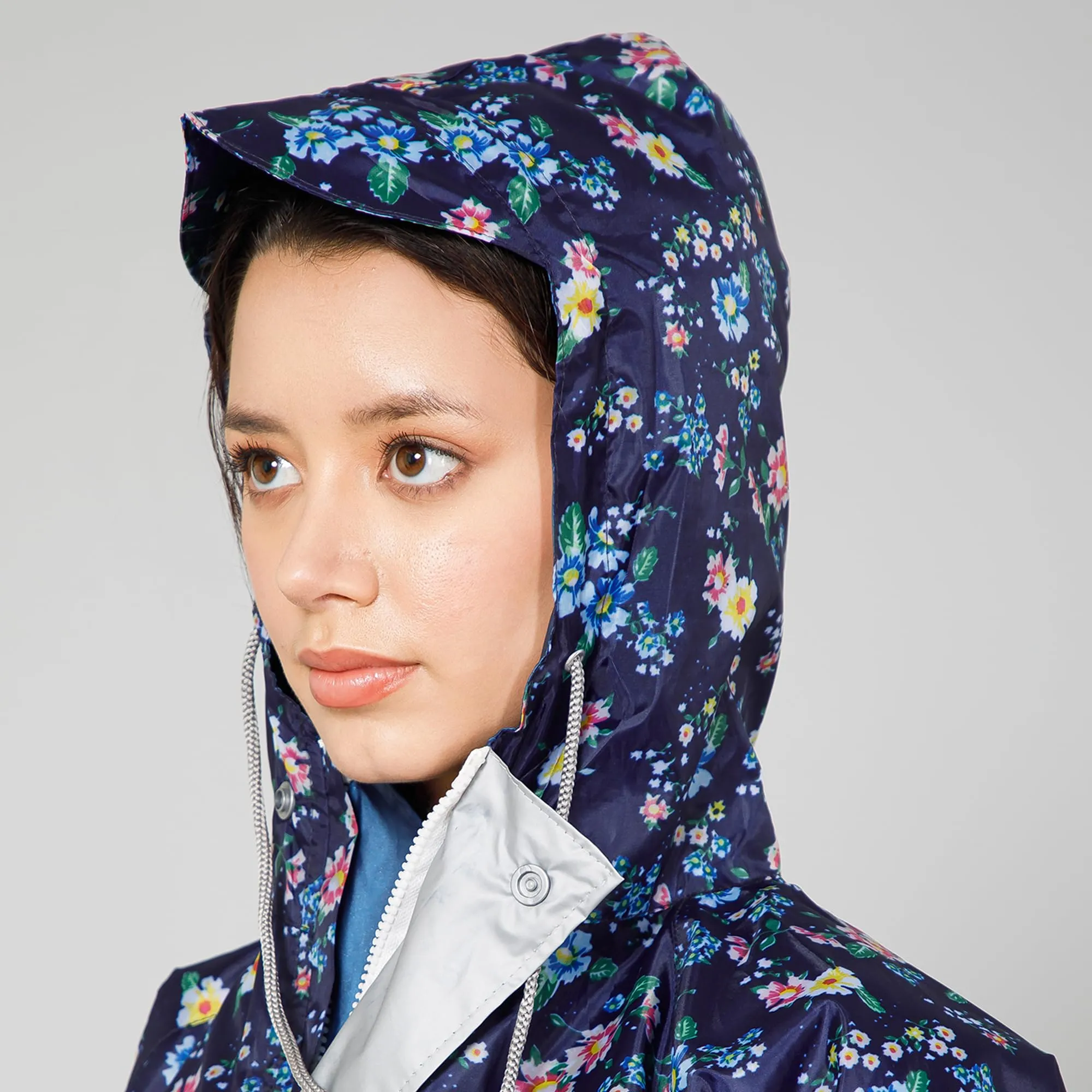 THE CLOWNFISH Polyester Waterproof Rain Coat For Women Skirt and Top Raincoat With Adjustable Hood and Front Pockets Rain Glam Series (Dark Blue Floral, XX-Large)