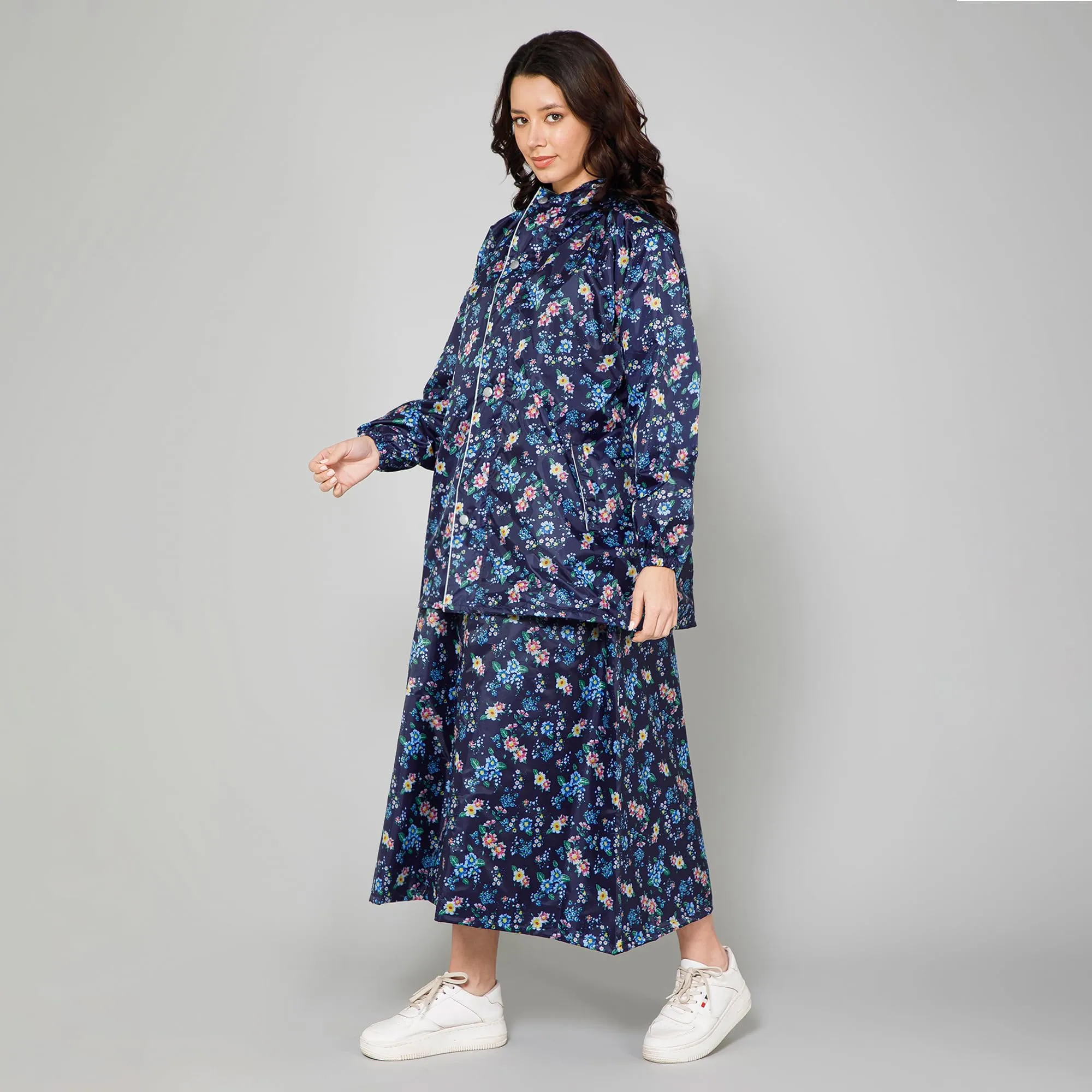 THE CLOWNFISH Polyester Waterproof Rain Coat For Women Skirt and Top Raincoat With Adjustable Hood and Front Pockets Rain Glam Series (Dark Blue Floral, XX-Large)