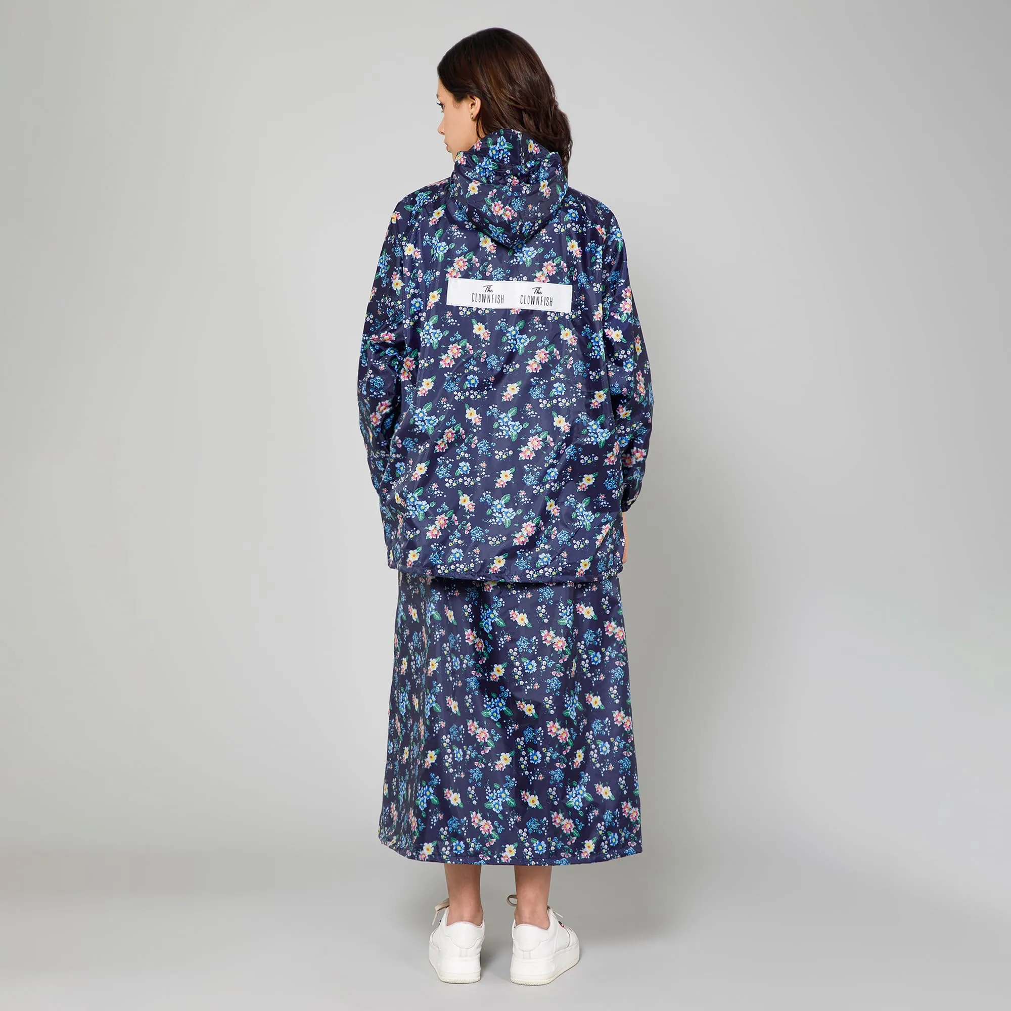 THE CLOWNFISH Polyester Waterproof Rain Coat For Women Skirt and Top Raincoat With Adjustable Hood and Front Pockets Rain Glam Series (Dark Blue Floral, XX-Large)